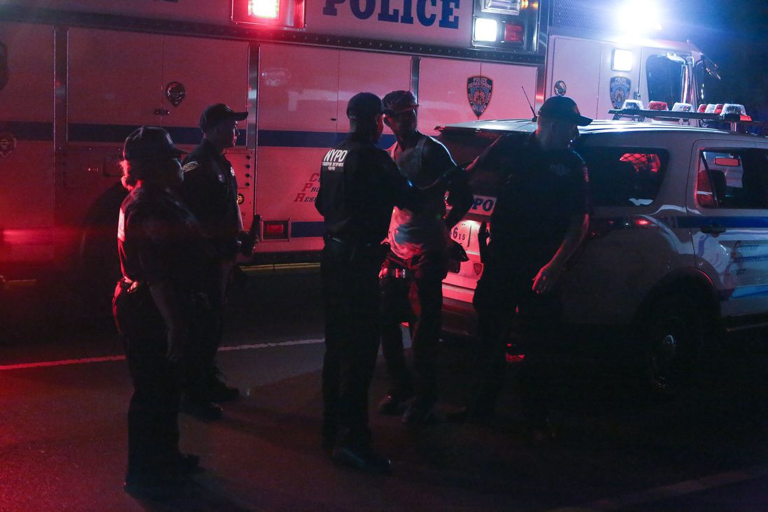 A man being arrested on Flatbush Avenue (Ellen Moynihan / Gothamist)